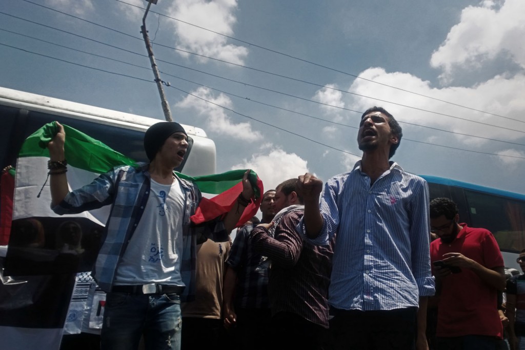 Volunteers chant in solidary with Gaza, at al-Balouza checkpoint.