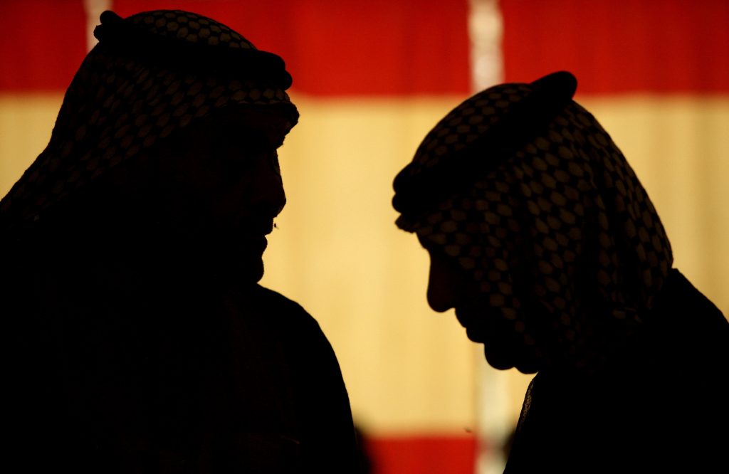 ** FILE ** In this June 26, 2008 file photo, Sheiks from the Shiite Tammimi tribe confer at a reconciliation meeting with the Sunni Jabouri tribe in Muqdadiyah, north of Baghdad. (AP Photo/Maya Alleruzzo)