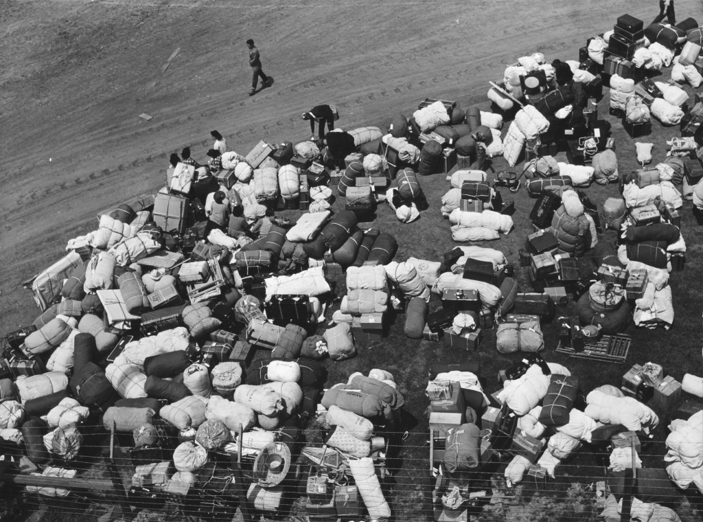The baggage of Japanese Americans from the west coast, at a makeshift reception center located at a racetrack. Source Wikipedia/CC