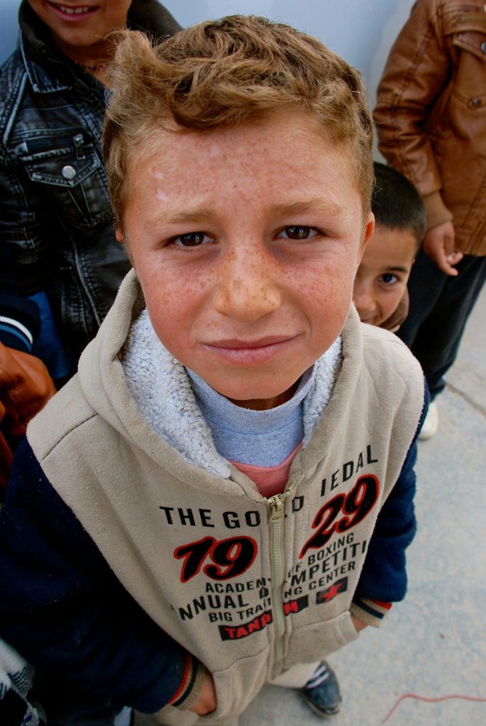 A young Iraqi refugee wandering the streets of Dohuk in Northern Iraq.