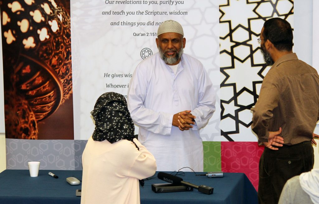 While ultra-conservatives have occasionally frowned on the sheikh taking one-on-one questions from women students at breaks in his lectures, he makes himself readily accessible to all his students. >Photo courtesy of Cambridge Islamic College