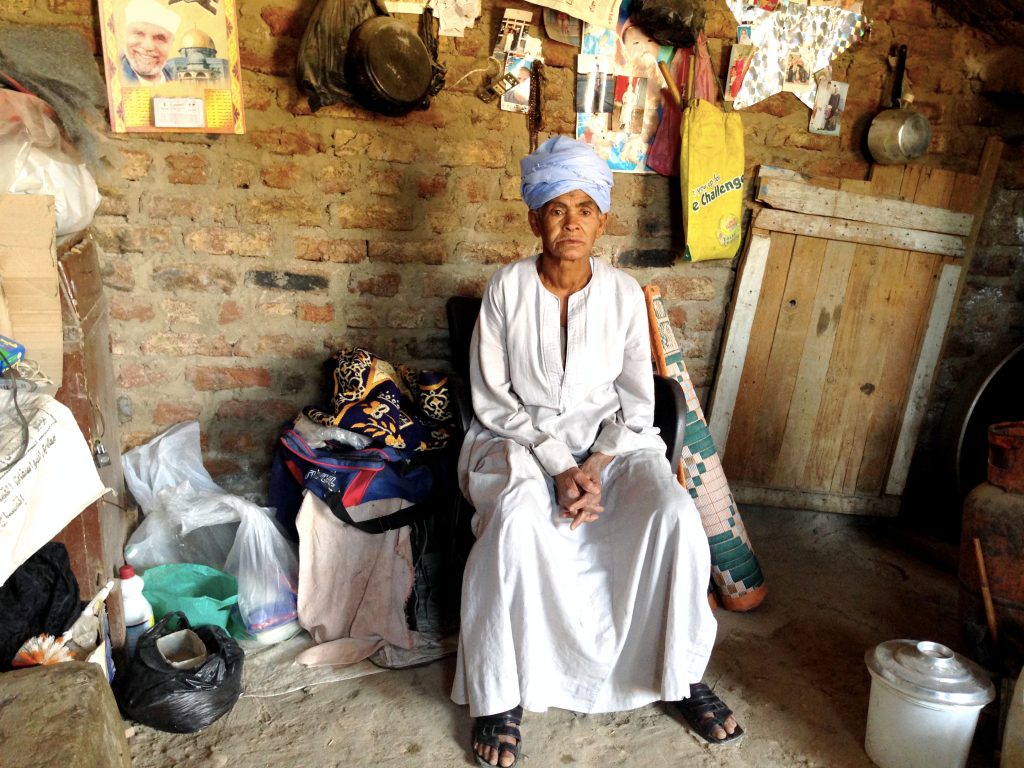Sisa Abu Daooh at home. She spent the last 43 years dressed as a man to make ends meet for her and her daughter. 