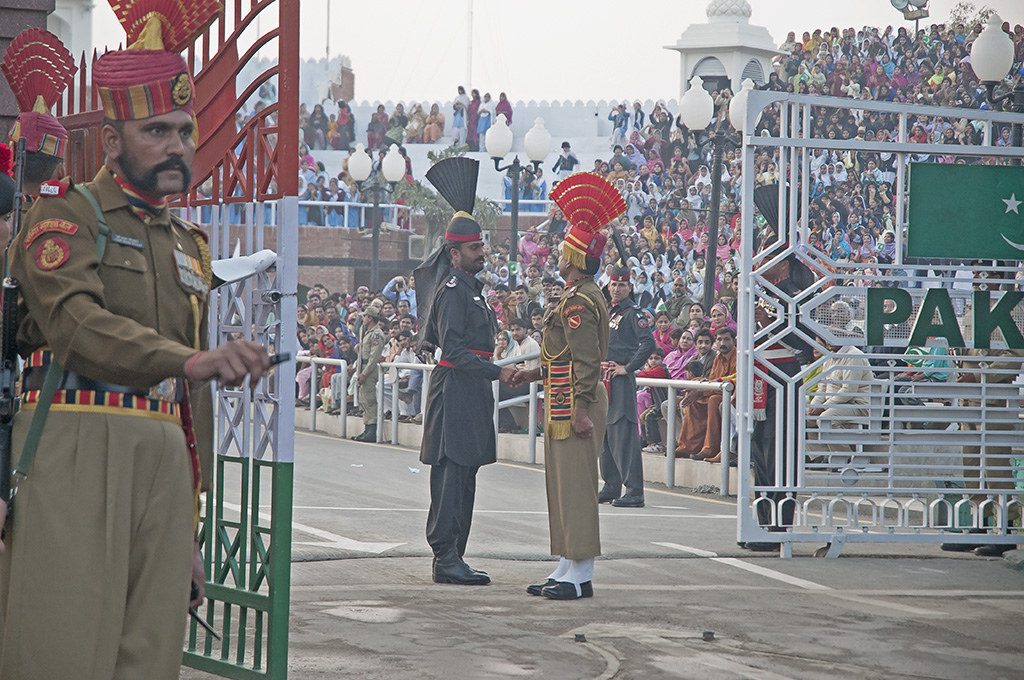 Flag ceremony on the Indian-Pakistani border >Flickr/Koshy Koshy