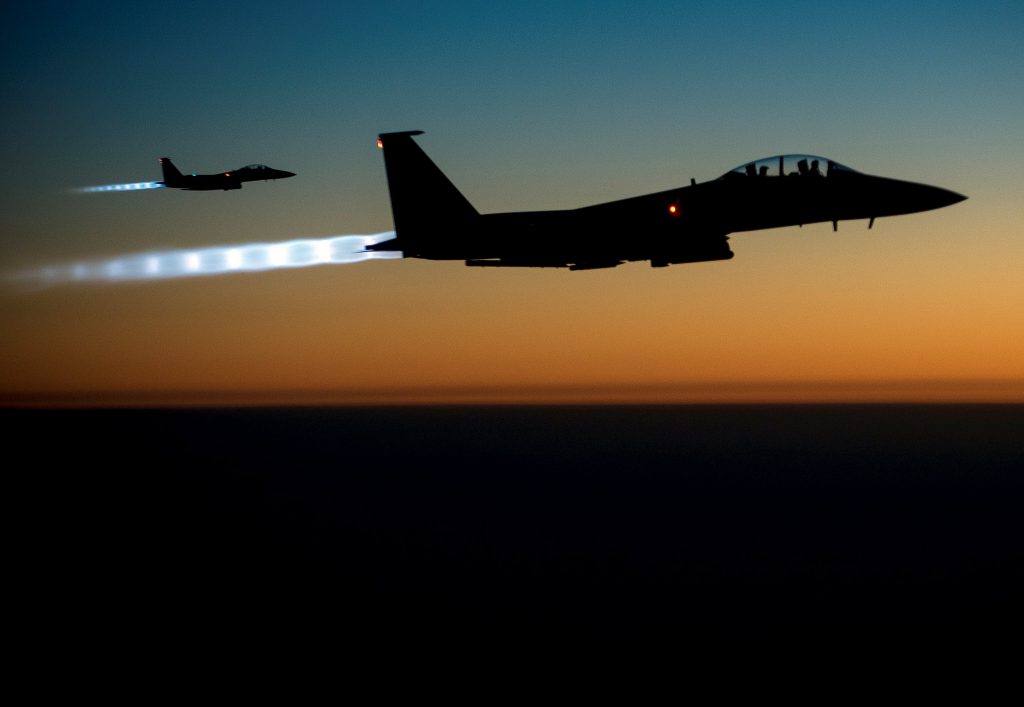 Two U.S. F-15E Strike Eagle aircraft flying over northern Iraq after conducting airstrikes in Syria. >Flickr/Stuart Rankin