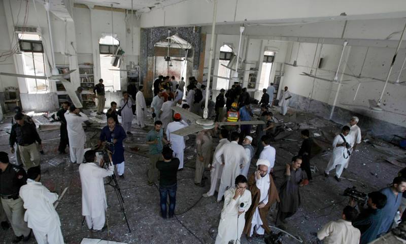 The mosque is left devastated after it was attacked by a suicide bomber during Friday prayers in Peshawar, Pakistan. Photo Credit: Samar Abbas
