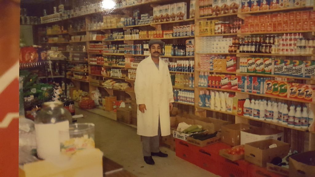 Adam Samad's father in the 1980s in his store Al-Amin in Queens, NY. Copyright Adam Samad